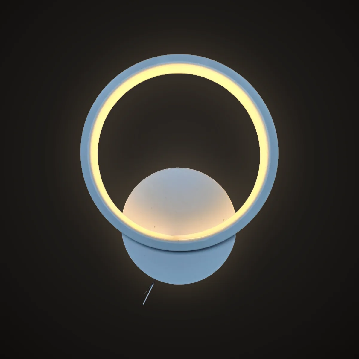 Halo ring LED wall light glowing warm white